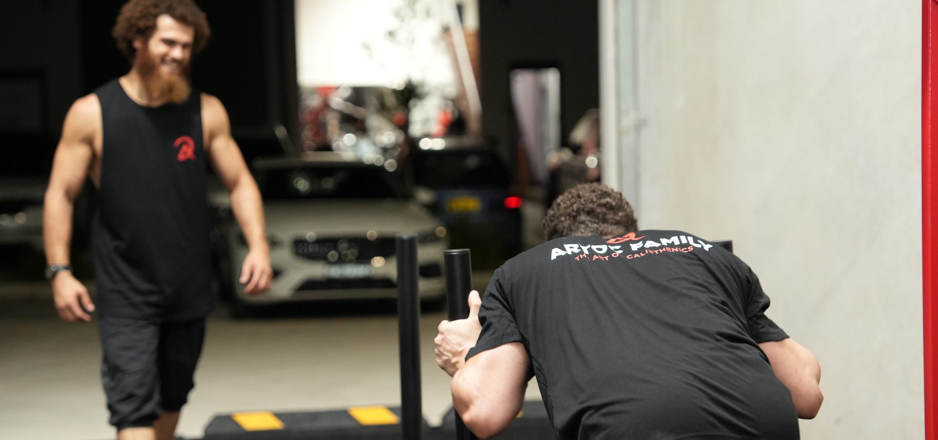 Man doing Sled Run for lower body training